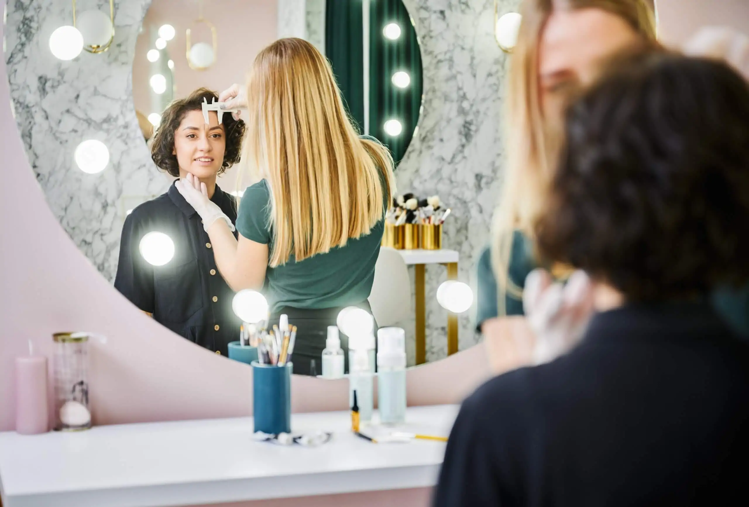 Beauty salon professional treating a client