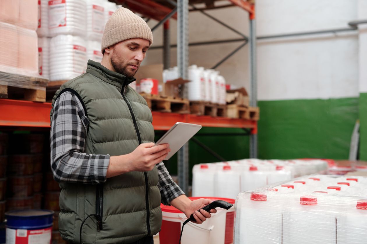 Warehouse staff processing returned stock back to a supplier