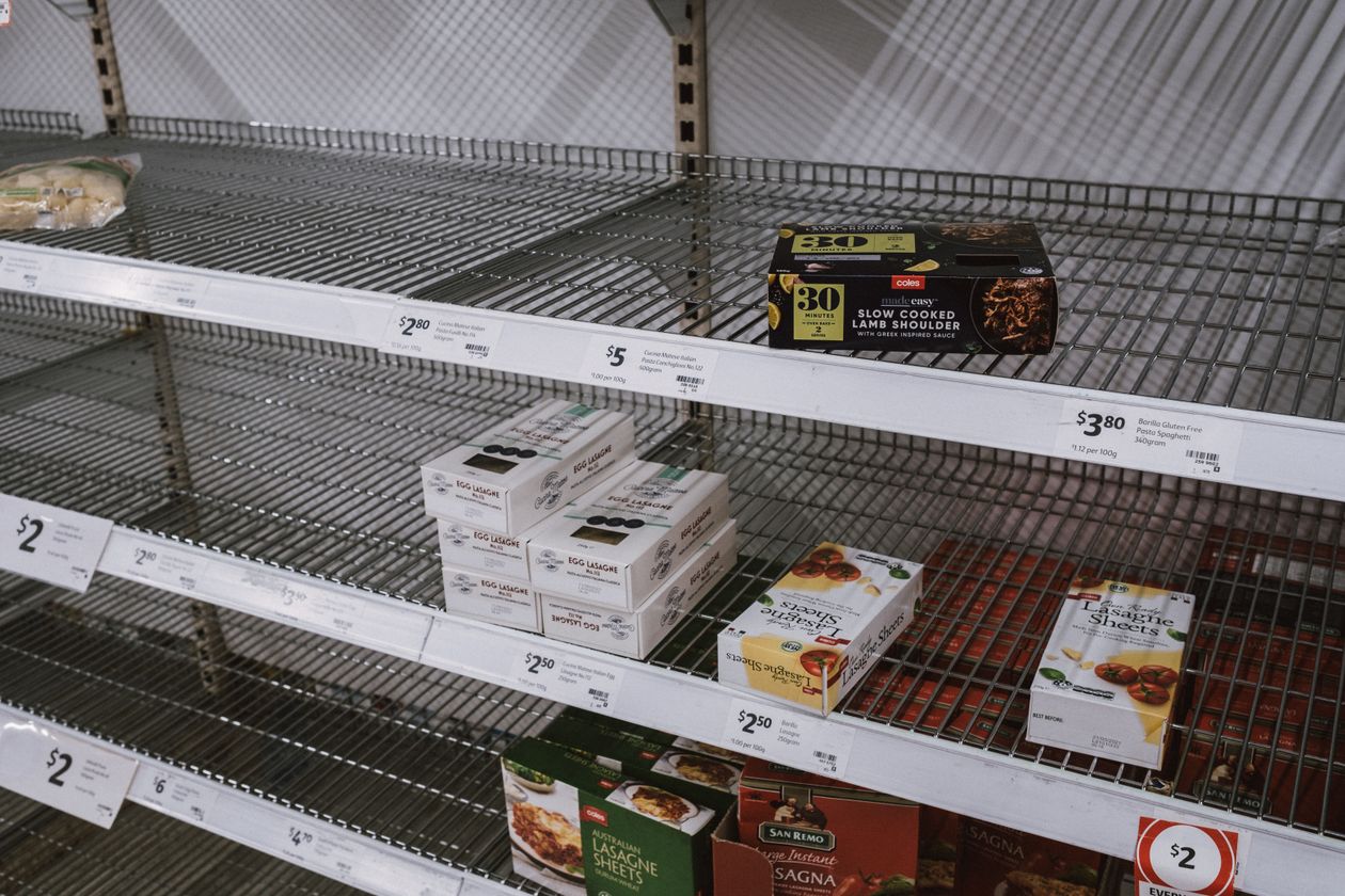 Empty retail shelves showing stock loss in a store