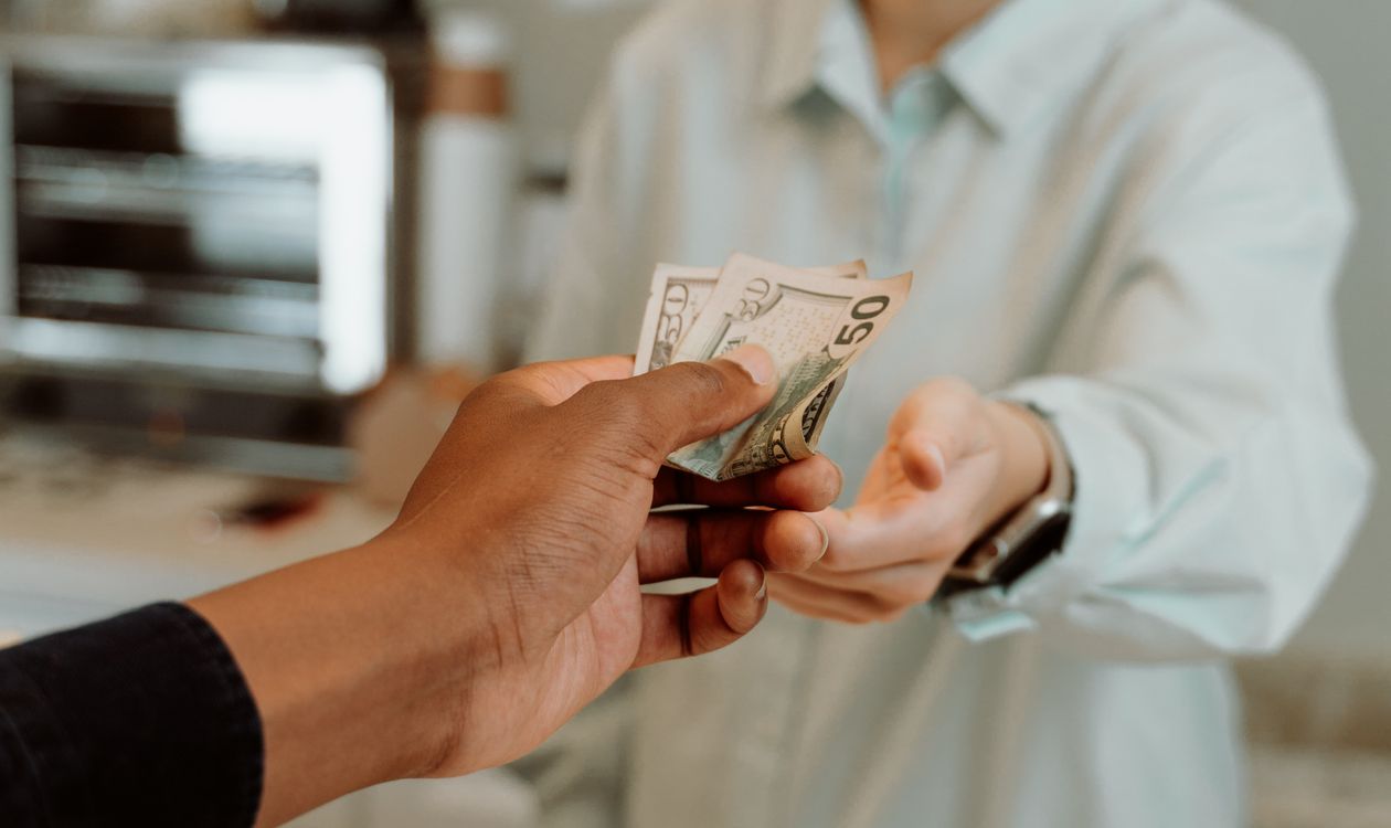 Card payment being processed at a service business counter in Punjab